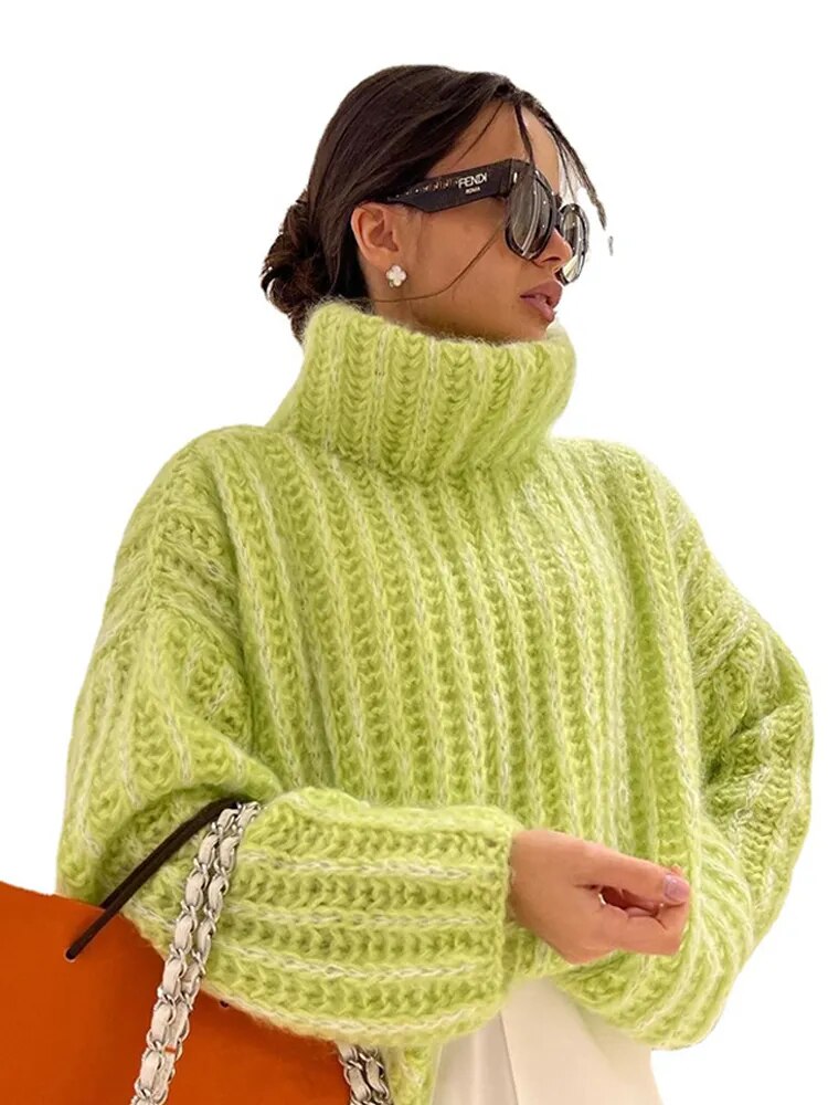 Knitted sweater with a high neck