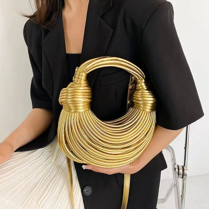 Women's bag made with golden rope