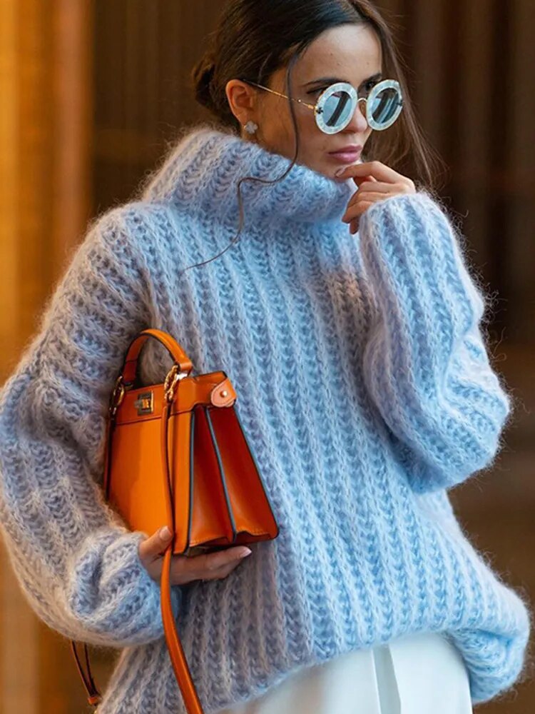 Knitted sweater with a high neck