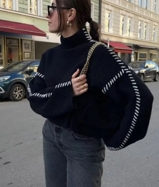 Knitted pullover with a high neck